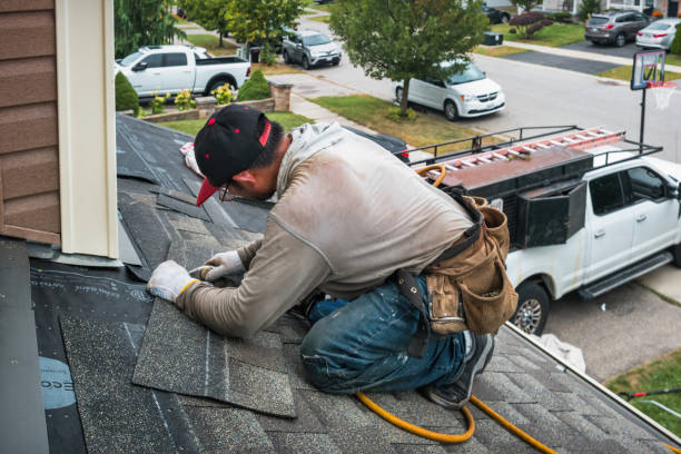Professional Roof Repair technician working in West Bloomfield, NY